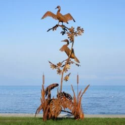 Komoranpaar Aus Metall Sitzt Im Schilf - Skulptur Aus Handarbeit - Kompaara -Outlet GARTENTRAUM Store komoranpaar aus metall sitzt im schilf skulptur aus handarbeit kompaara4